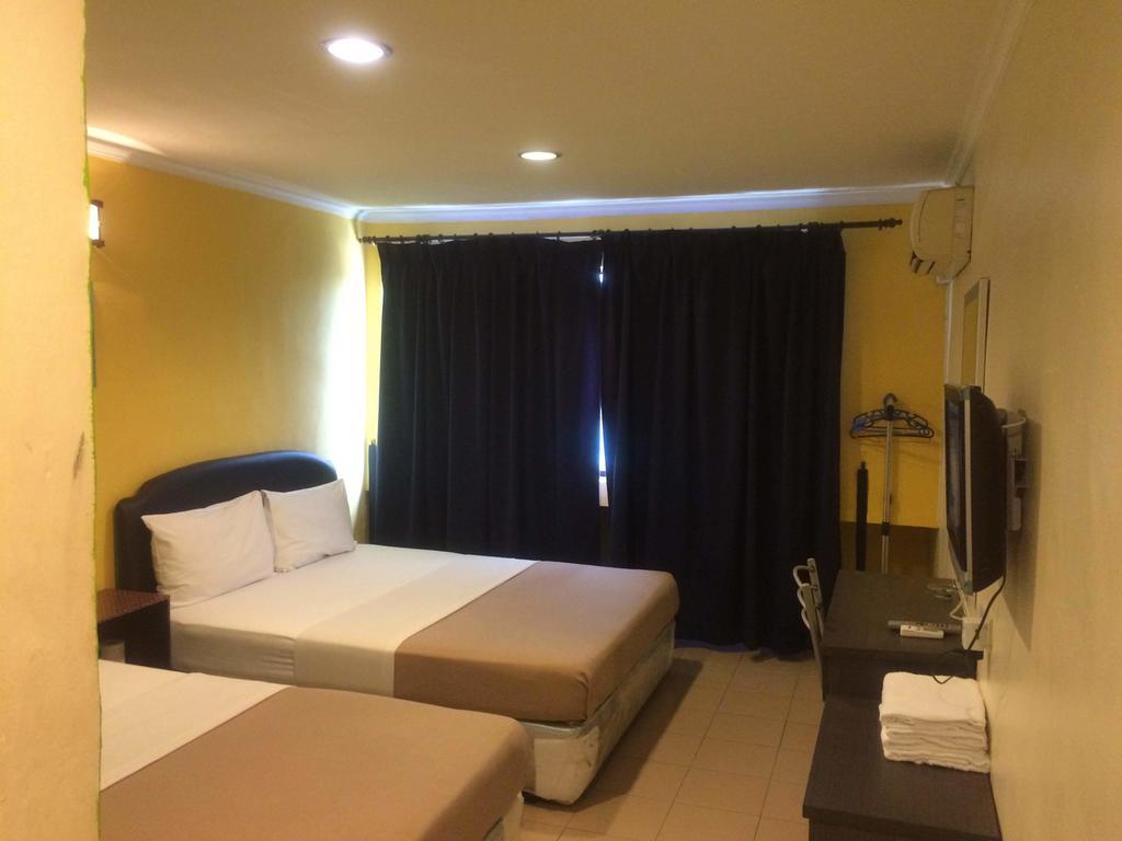 City Star Hotel Kulai Pokoj fotografie