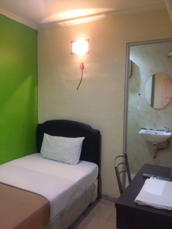 City Star Hotel Kulai Pokoj fotografie