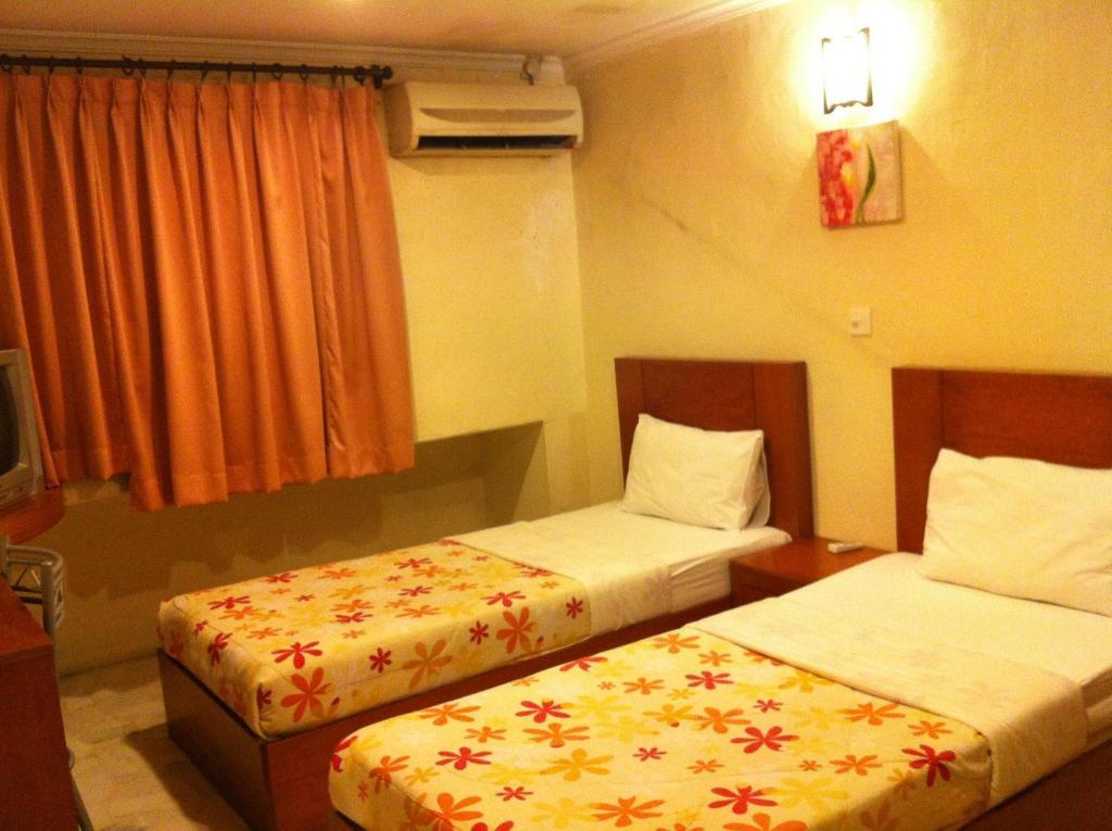 City Star Hotel Kulai Pokoj fotografie